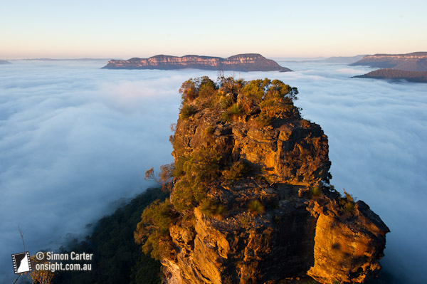 The Jamison Valley, Blue Mountains, blanketed by an inversion layer with Mount Solitary in the background. NSW, Australia.