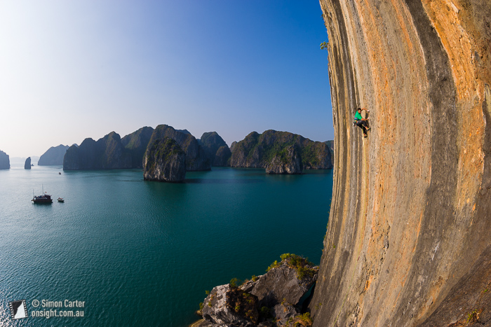 Lee Cujes making the first ascent of License to Climb Harder (7c), on The Face -- one of 2153 limestone karsts in Ha Long Bay, Vietnam.